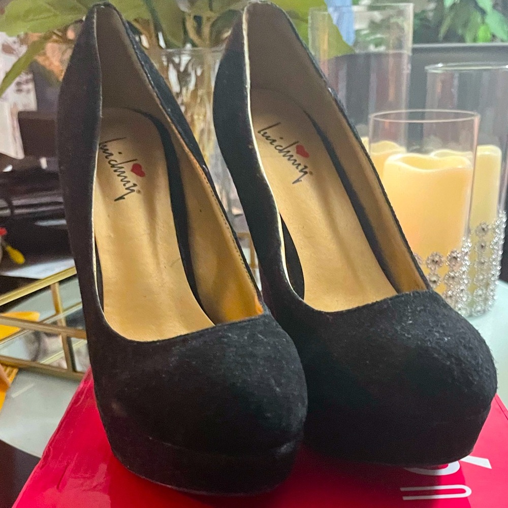 Black suede platform shoes